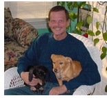 Jeff Hicks with his dogs, Molly and Magi